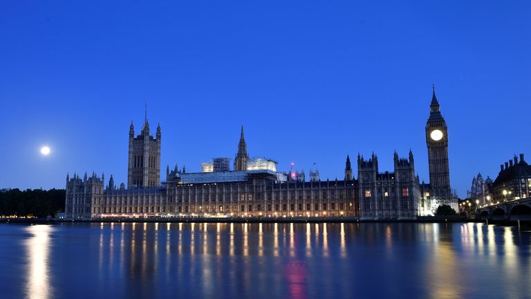 The sun rises over the Houses of Parliament 