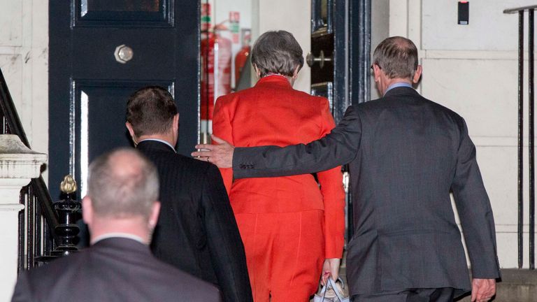 Theresa May and her husband Philip arrive at Conservative Party HQ in Westminster