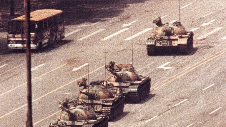 A man stands in front of a convoy of tanks in Tiananmen Square in 1989