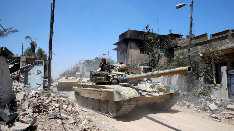 An Iraqi military tanks advances towards Islamic State-held territory in Mosul