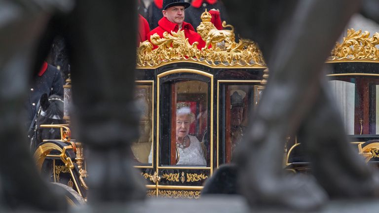 Queen Elizabeth II on her way to address the State Opening of Parliament in May 2016