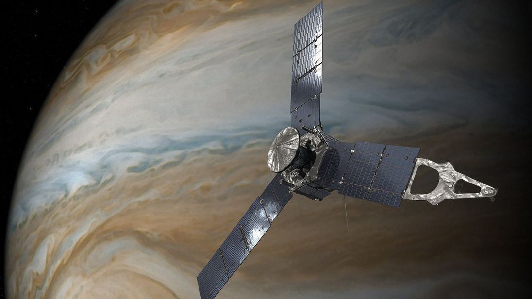 An artist&#39;s impression of Juno orbiting Jupiter. Pic NASA/JPL-Caltech