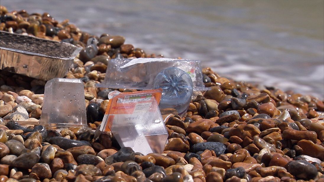 Litter on a pebbled beach