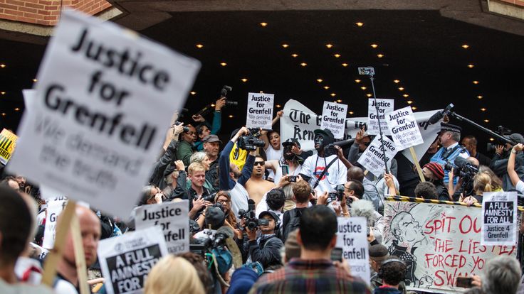 Protesters demonstrate outside the first full Kensington council meeting held since the Grenfell Tower fire which claimed at least 80 lives