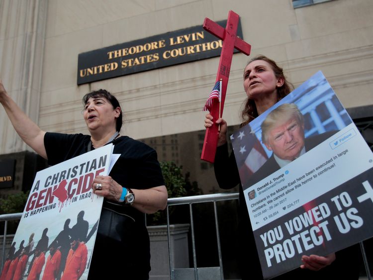 Protesters demonstrate outside a court hearing to halt the deportation of 1,400 Iraqi nationals. (file photo)
Protesters rally outside the federal court just before a hearing to consider a class-action lawsuit filed on behalf of Iraqi nationals facing deportation, in Detroit, Michigan, U.S., June 21, 2017. REUTERS/Rebecca Cook