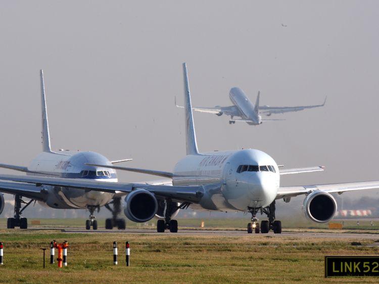 Planes queue to take off on the Southern runway at Heathrow Airport