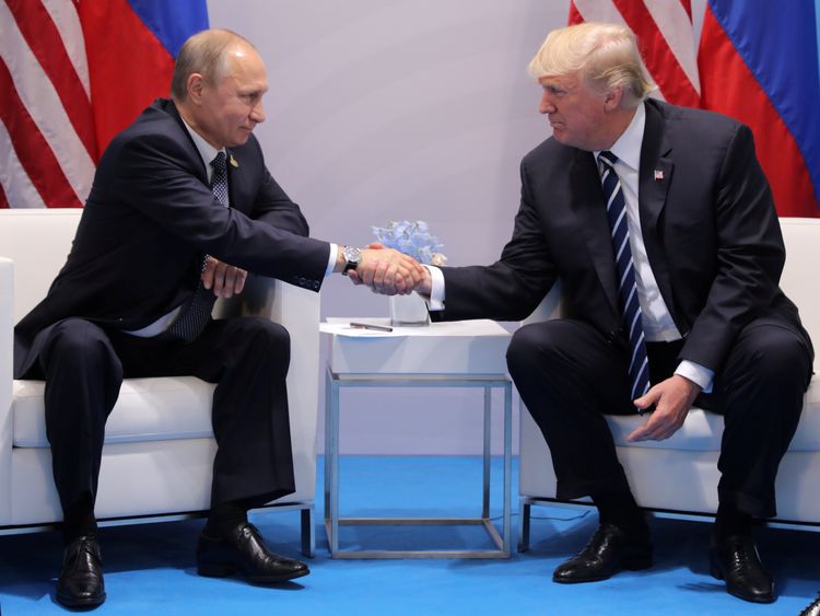 U.S. President Donald Trump shakes hands with Russia's President Vladimir Putin during their bilateral meeting at the G20 summit in Hamburg