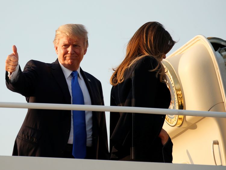 President Trump gave a thumbs up as he departed for Paris with First Lady Melania