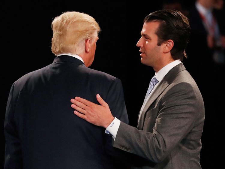 Donald Trump Jr greets his father during the US election campaign in October last year