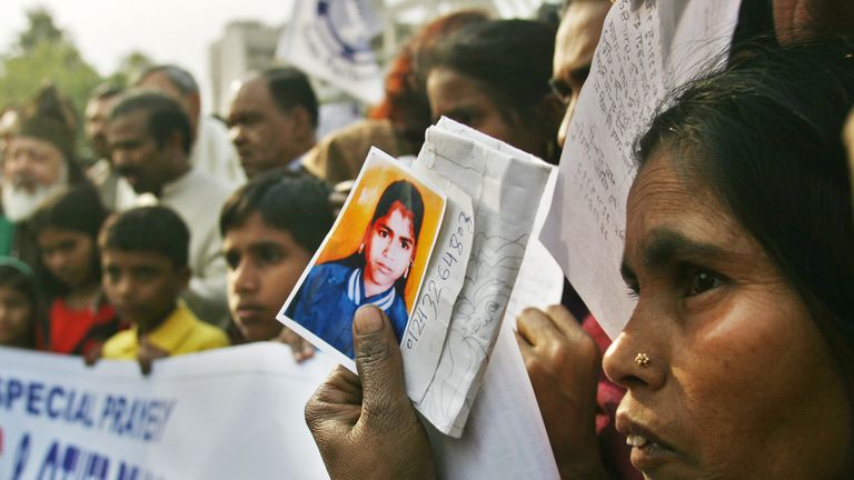 Relatives of missing children at a prayer meeting near Pandher&#39;s house in 2007