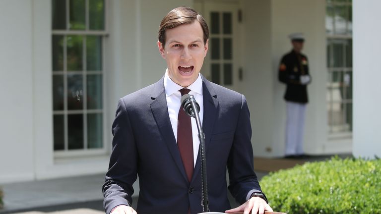Jared Kushner reads a statement in front of the White House after testifying