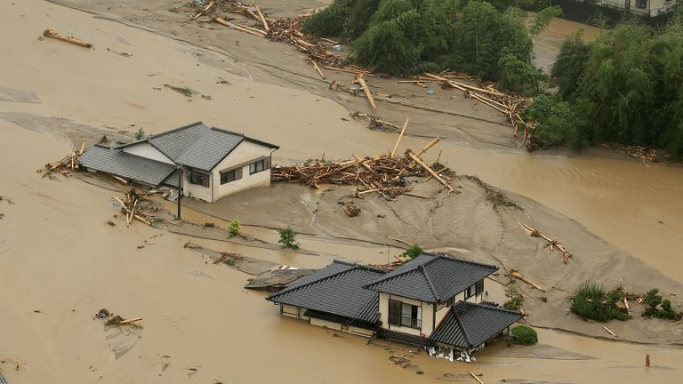 Homes have been buried and dirt and floodwater