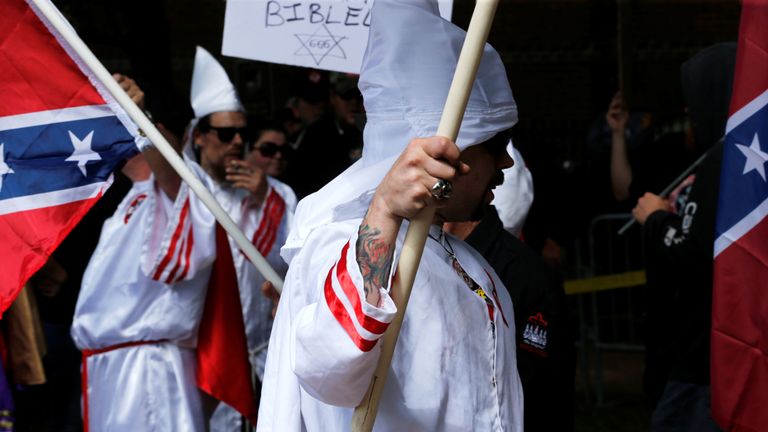 Members of the Ku Klux Klan rally in opposition to city proposals to remove or make changes to Confederate monuments in Charlottesville