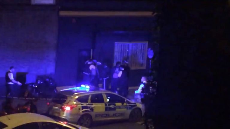 Police help one of the alleged victims of the acid attacks in Queensbridge Road, Hackney