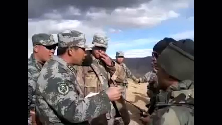 Chinese and Indian troops argue at the disputed border