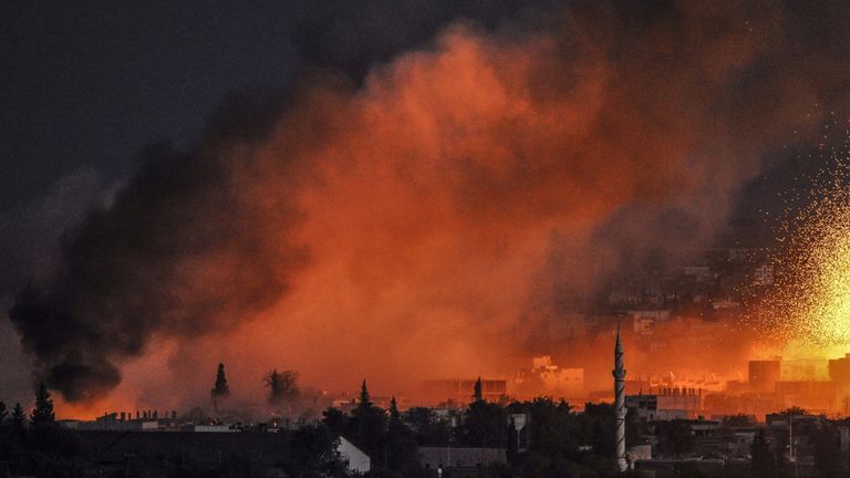 Smoke and flames rise following an explosion in the Syrian town of Kobane