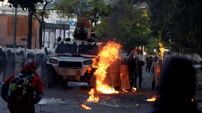A riot security forces vehicle is set on fire