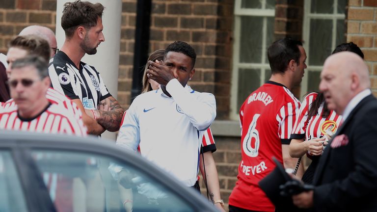 Defoe wore an England short for the funeral