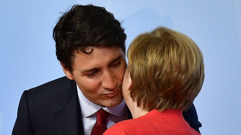 German Chancellor Angela Merkel (R) welcomes Canada&#39;s Prime Minister Justin Trudeau
