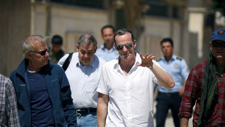 Brett McGurk, U.S. envoy to the coalition against Islamic State, gestures as he walks in the town of Tabqa, Syria June 29, 2017. REUTERS/Rodi Said