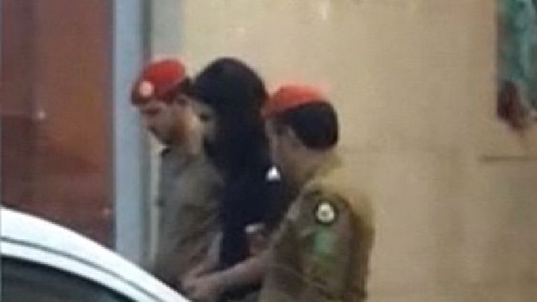 Police led the hooded prince away in handcuffs