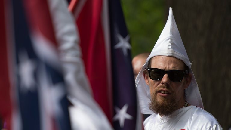 A Klan member looks on during protests in Virgina
