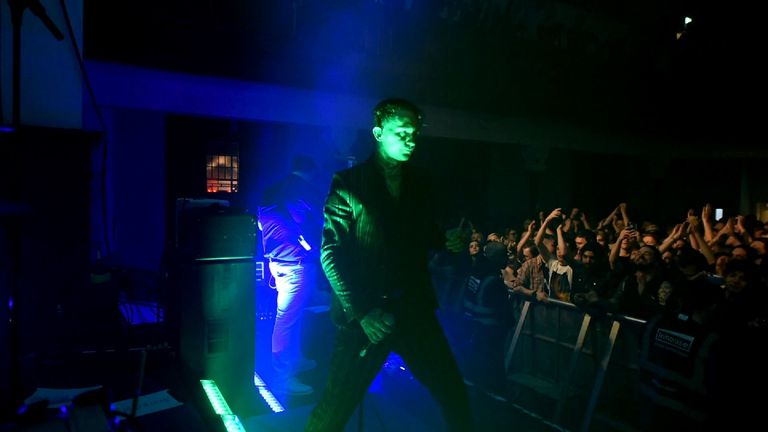 Band performing on stage.