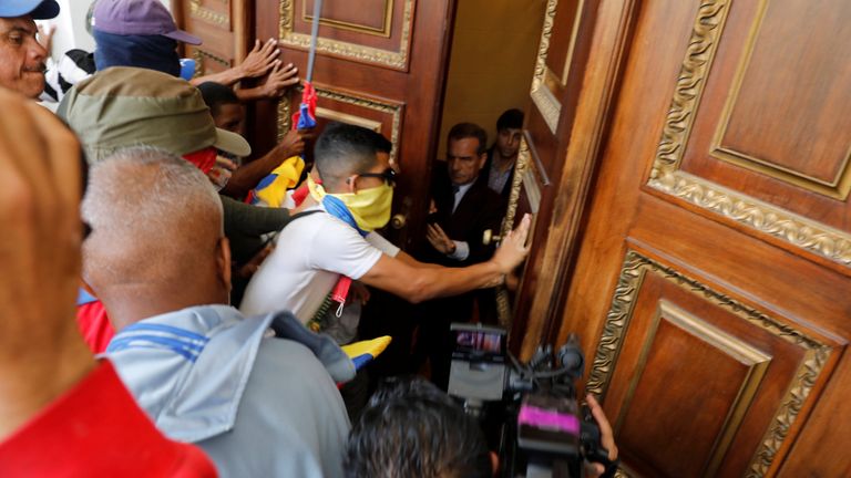 Government supporters try to enter Venezuela's opposition-controlled National Assembly