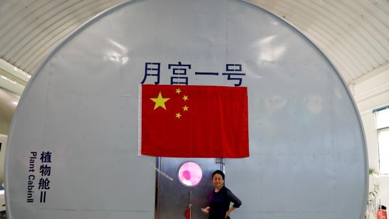 Liu Hong, chief designer of the Lunar Palace 365 Project stands outside a simulated space cabin. Pic: REUTERS/Damir Sagolj