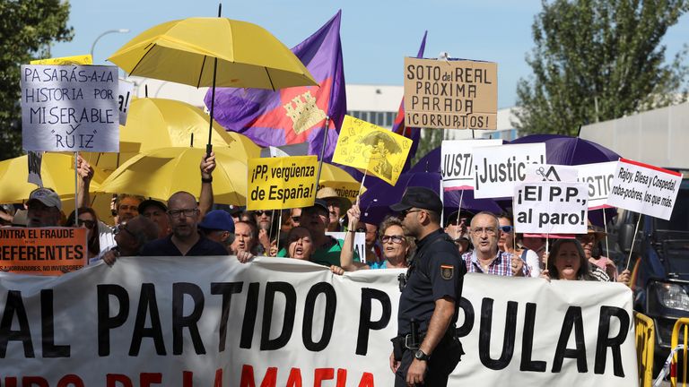 Dozens of people protested outside the courthouse as Mr Rajoy gave evidence