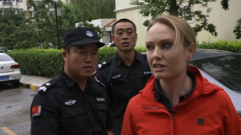 Katie Stallard is shoved away from Liu Xia&#39;s apartment in Beijing