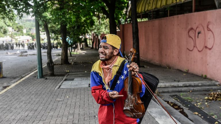 Arteaga said protests would not be stopped by 'smashing up' his violin