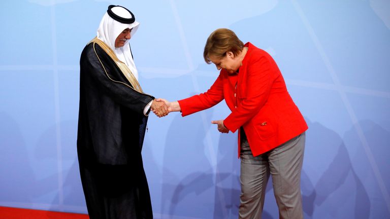 German Chancellor Angela Merkel welcomes Saudi Arabia&#39;s Minister of State Ibrahim Abdulaziz Al-Assaf 
