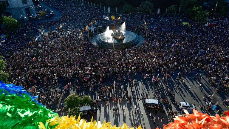 Thousands gather in Cibeles square in front of Madrid's City Hall before the march