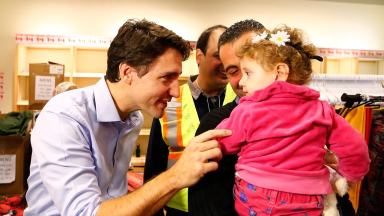 Justin Trudeau meets Syrian refugees arriving in Toronto