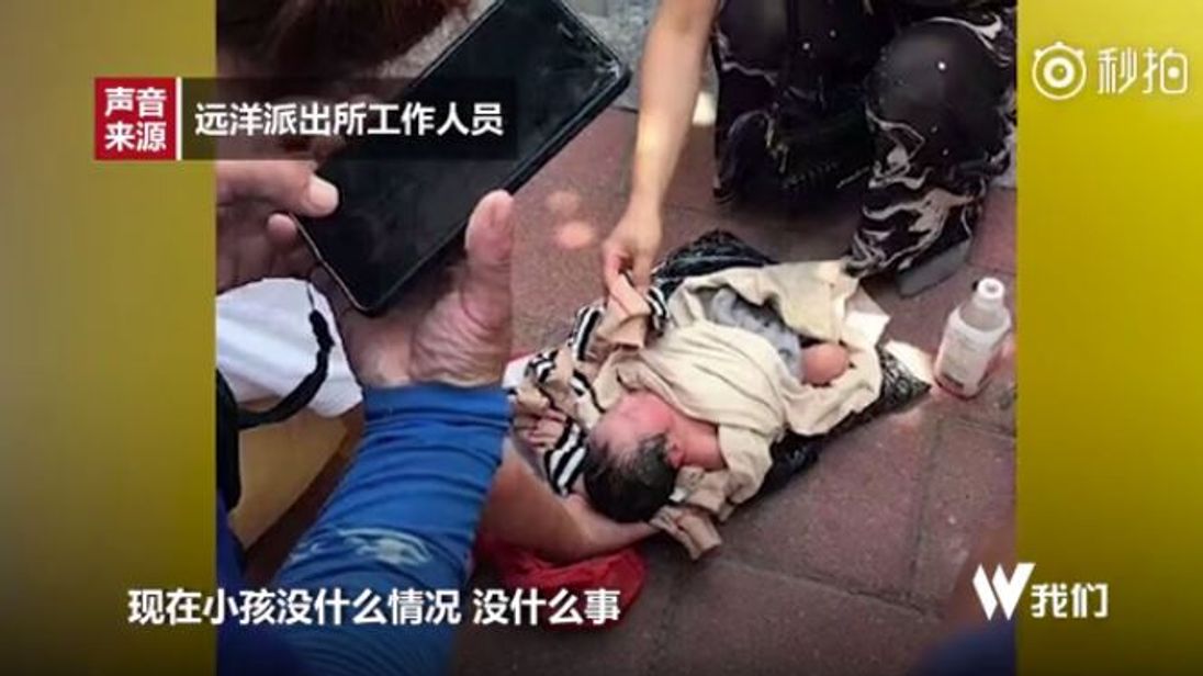 Baby rescued after its mother tried to post it to an orphanage in China
