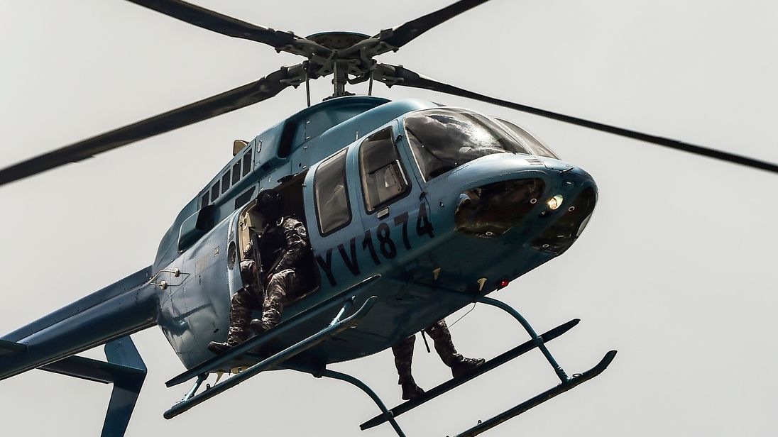 Security forces in helicopter fly over Valencia