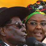 President Robert Mugabe and his wife Grace attend a rally in Chinhoyi