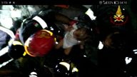 A baby is pulled alive from rubble following the Ischia earthquake