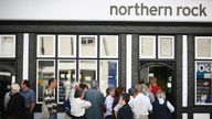File picture of customers queue to enter a Northern Rock bank branch in Bromley, in south-east London, on September 14, 2007