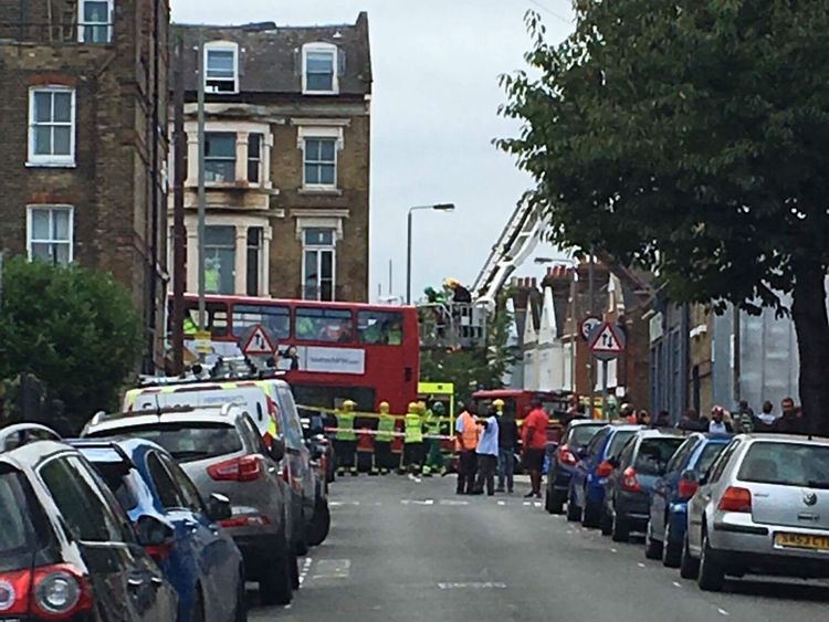 A double-decker bus has crashed into a shop on a busy London high street, Lavender Hill, near Clapham Junction train station in southwest London