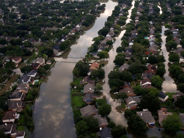 Houses are seen partially submerged in flood waters caused by Tropical Storm Harvey in Northwest Houston...