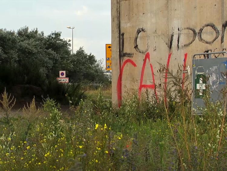Graffiti by Banksy makes a point about migrants