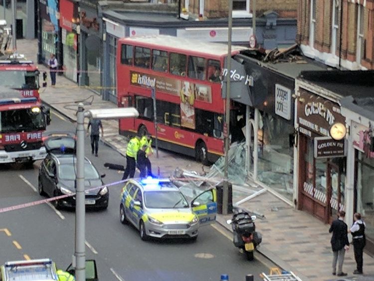 The scene after a double decker bus crashed into a shop in Lavender Hill