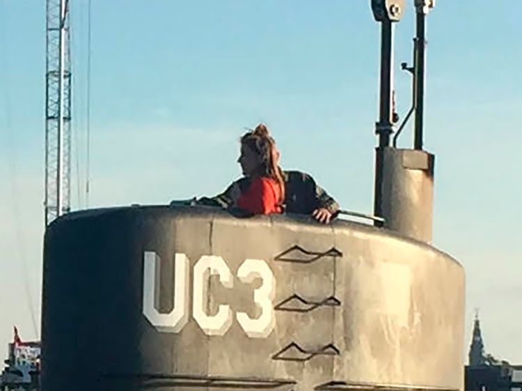 This photo shows allegedly Swedish journalist Kim Wall standing in the tower of the private submarine &#39;UC3 Nautilus&#39; on August 10, 2017 in Copenhagen Harbor
