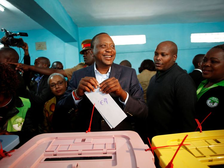 President Uhuru Kenyatta casts his vote in the election