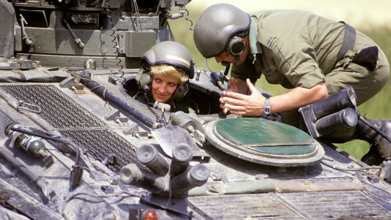 June 1988: Diana in the driving seat of the &#39;Striker&#39; tank, getting instructions from Sgt Chris O&#39;Byrne on Salisbury Plain