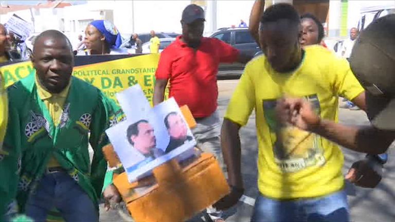 Protesters danced with mock coffins ahead of the verdict