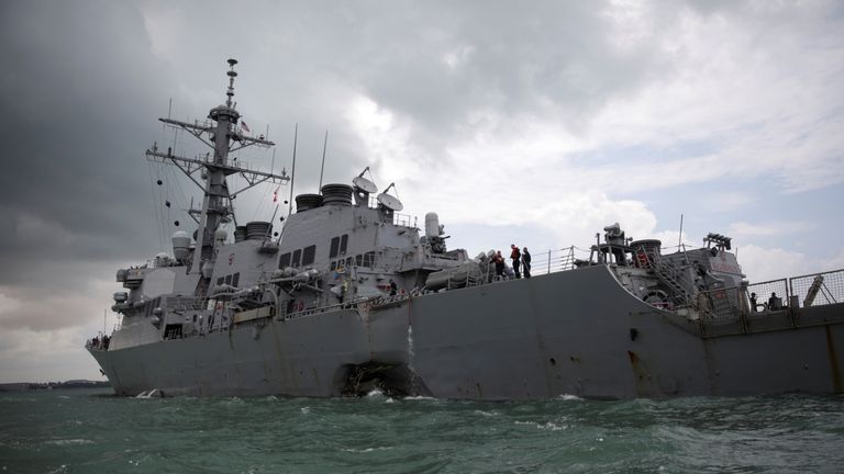 USS John S McCain returned to Singapore with a large hole in its hull