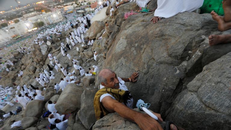 Muslim pilgrims gather on Mount Mercy on the plains of Arafat 